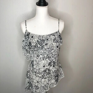 i.e. tank top size medium.  Black/white uneven heM